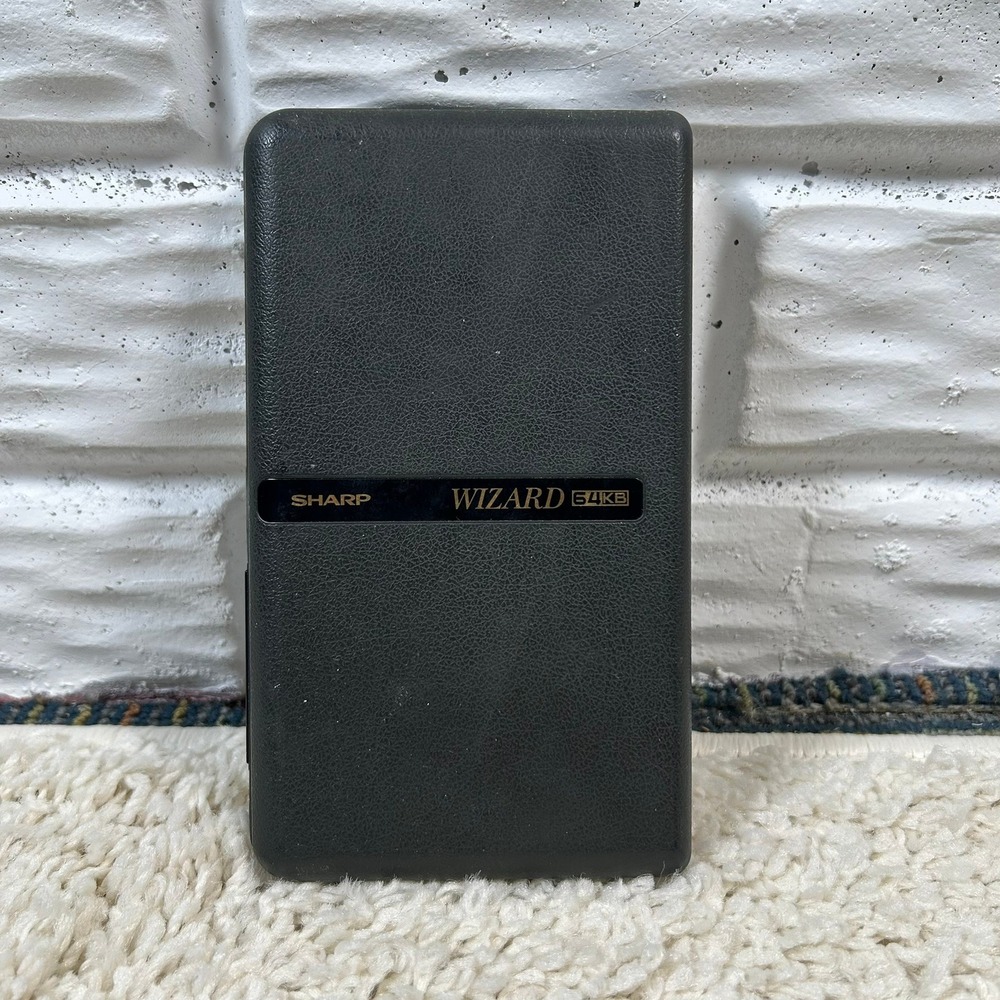 Sharp Wizard OZ-7200 Electronic Organizer 64KB Black Vintage Handheld UNTESTED